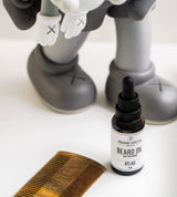 wooden beard comb with beard oil